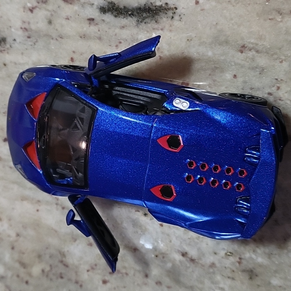 Blue and Red Die-cast Lamborghini  Sesto  Elemento